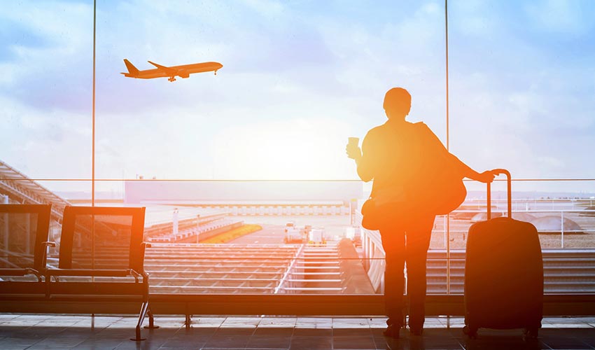 happy traveler in airport